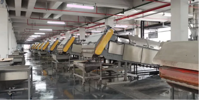 Multiple powder coating cooling belt systems arranged in a large-scale production workshop, showing continuous cooling and flaking equipment used in high-capacity powder coating factories